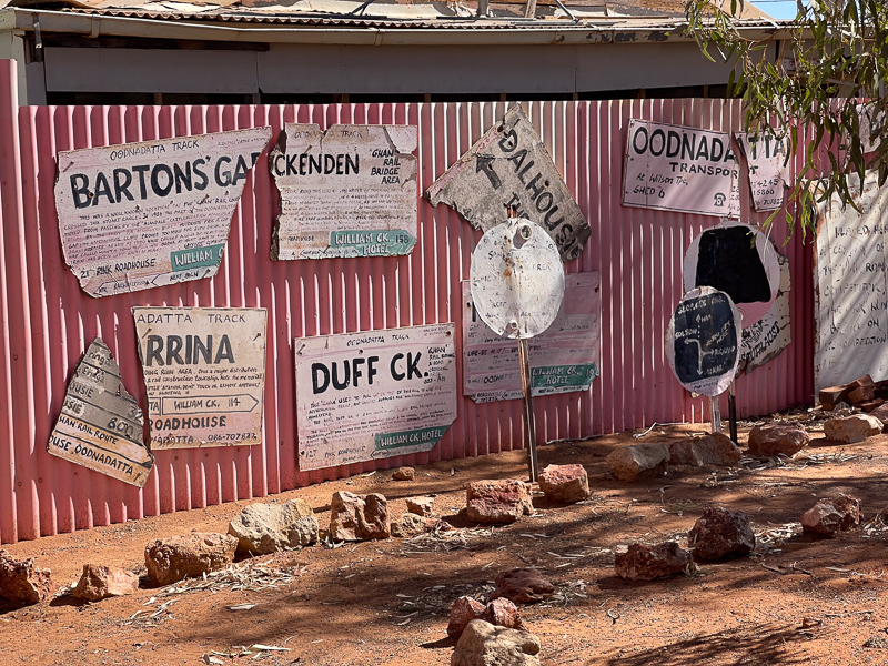 At the side of the Pink Roadhouse is a collection of signs